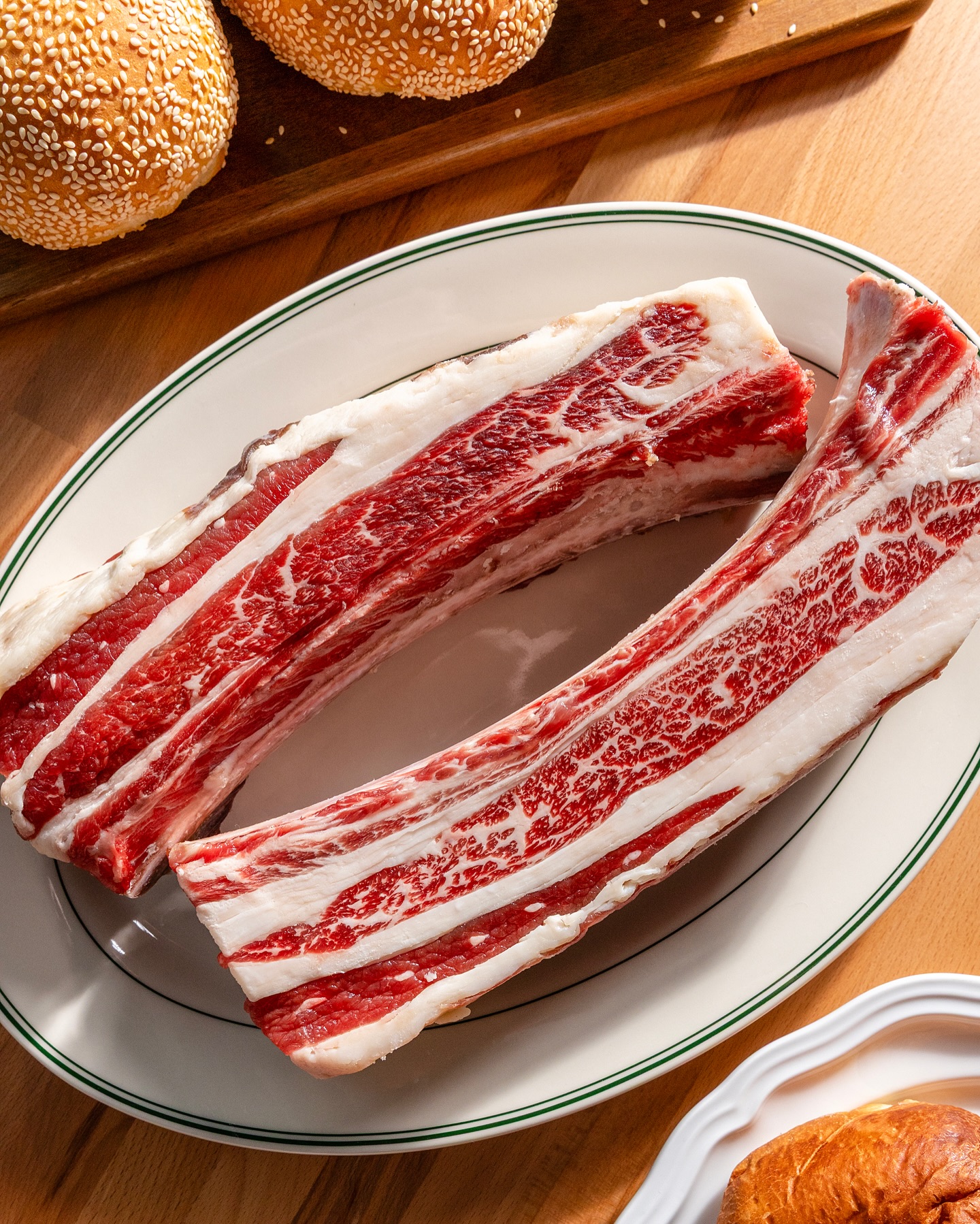 Marbled short ribs on a diner platter