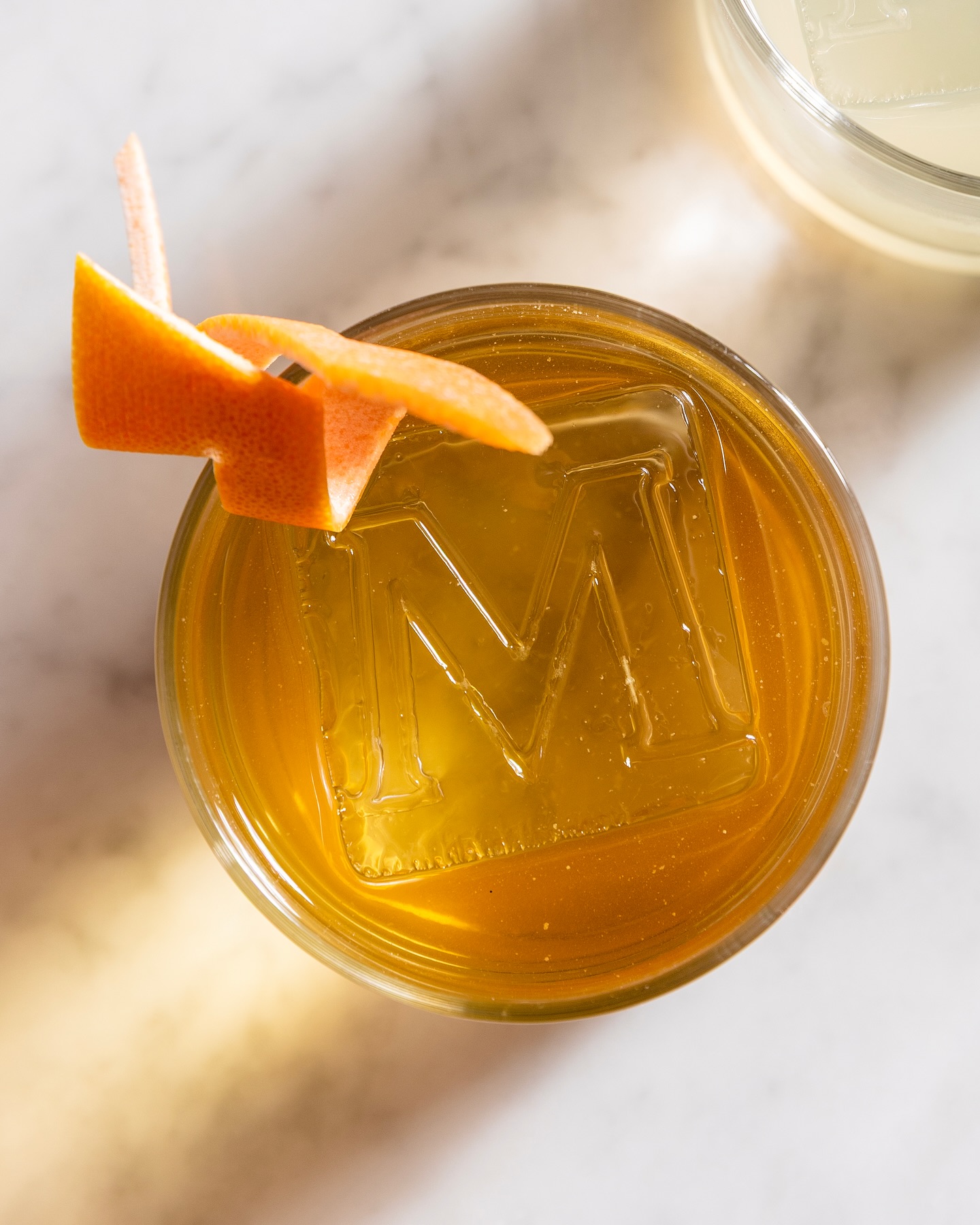 Signature cocktail with an M-branded ice cube